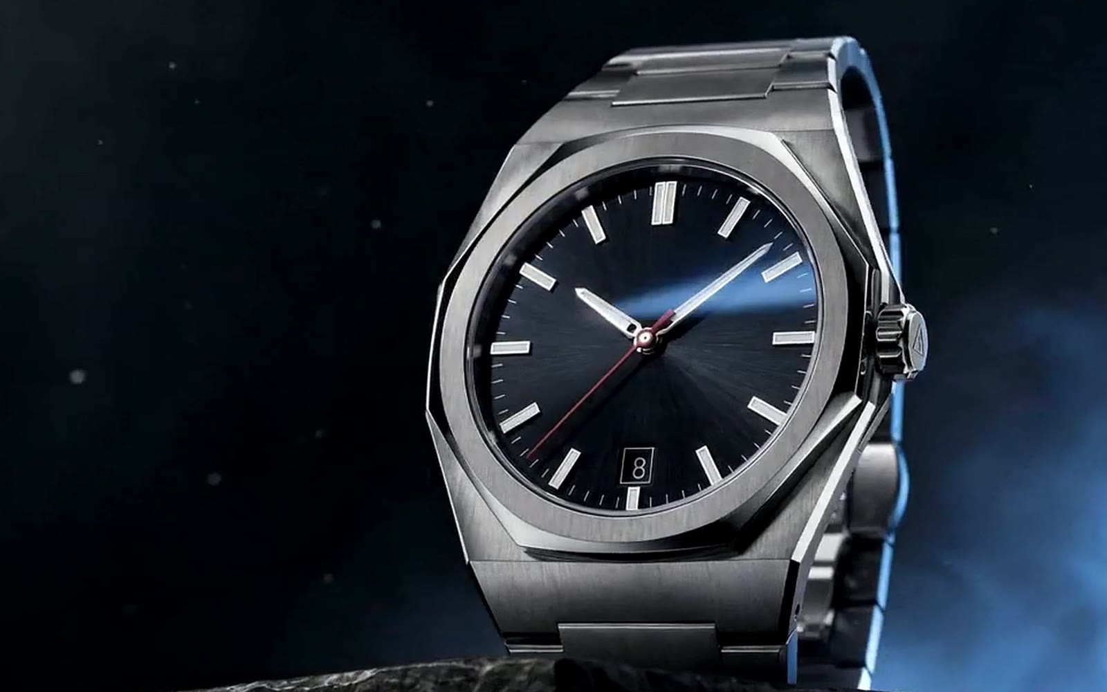Aurelian Chronos One watch on dark stone with blue light